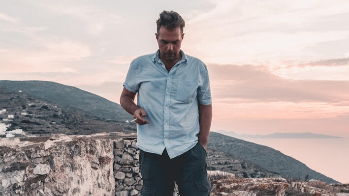 About Me SEO Consultant An image for an SEO Consultant Website featuring a sunset in Greece